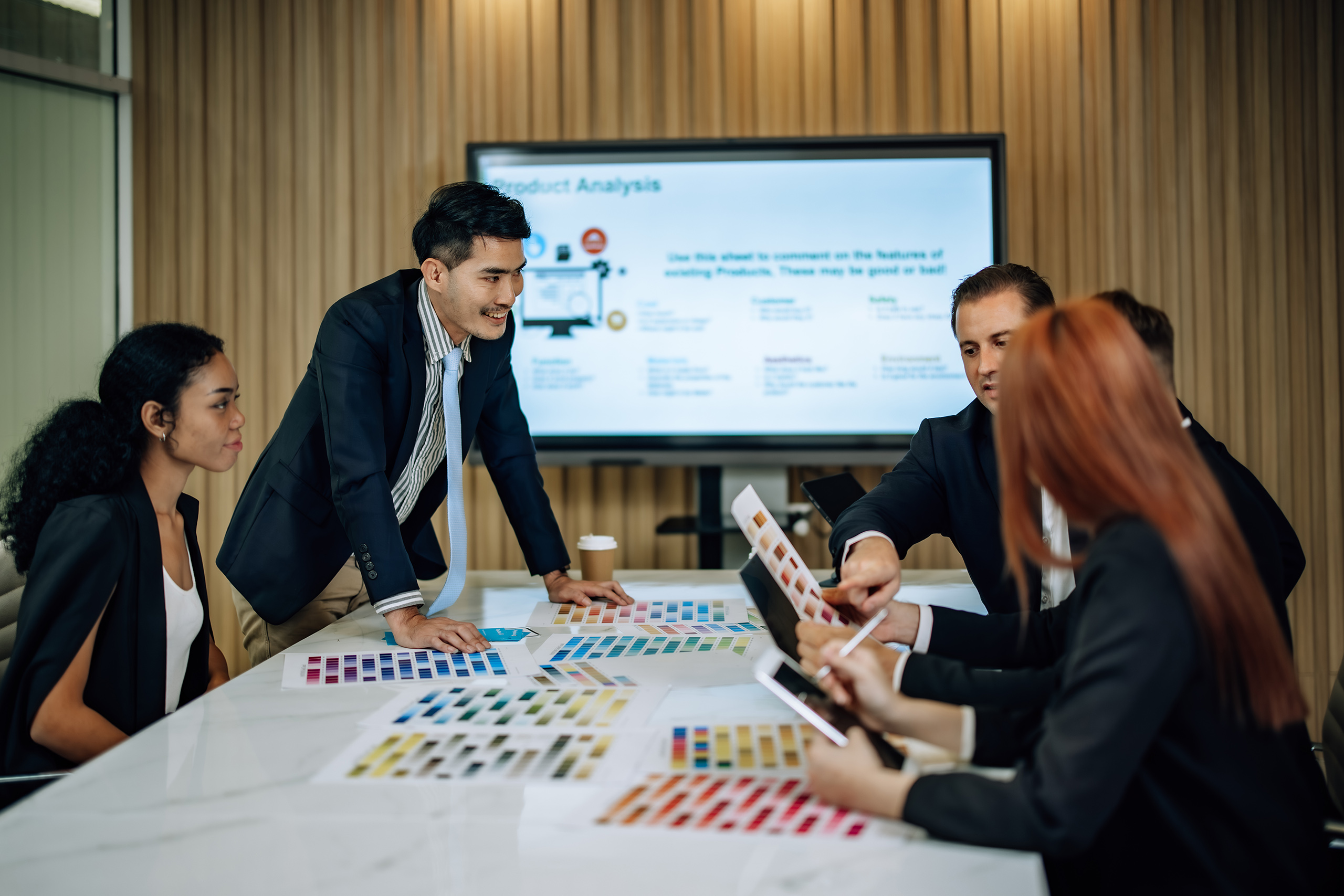 Diverse team apply design thinking to gather insights, propose s